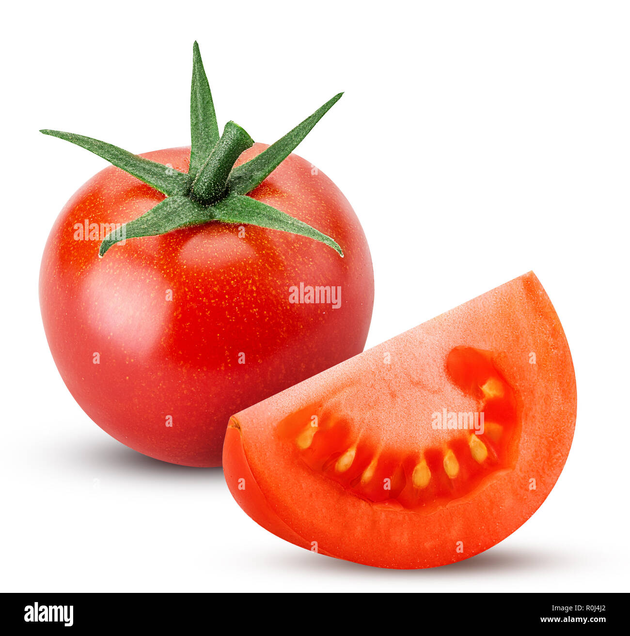 Fresh red tomato with green leaves and slice isolated on white background Clipping Path. Full depth of field. Stock Photo