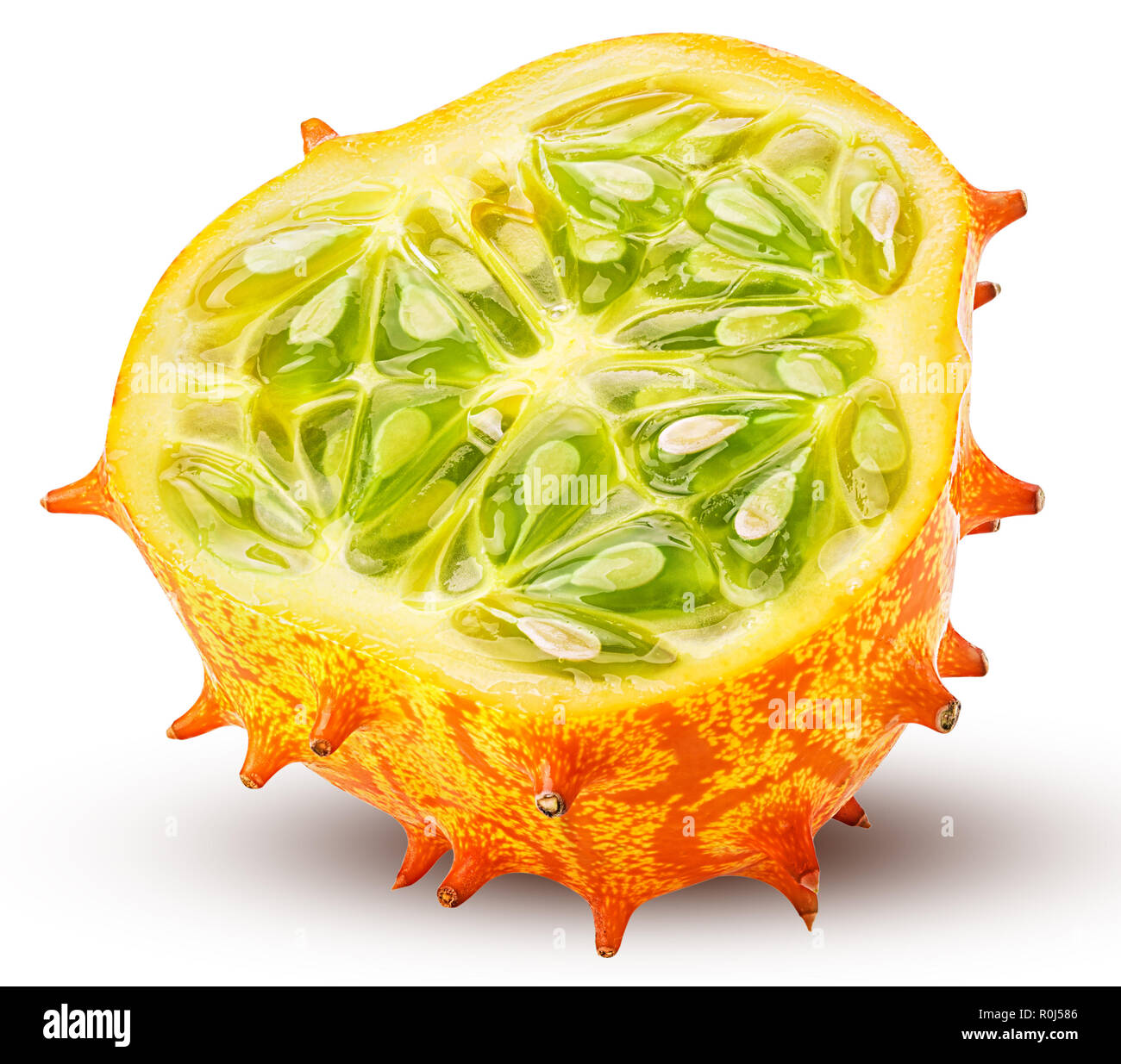 Kiwano, horned melon cut in half isolated on white background. Clipping Path. Full depth of field. Stock Photo