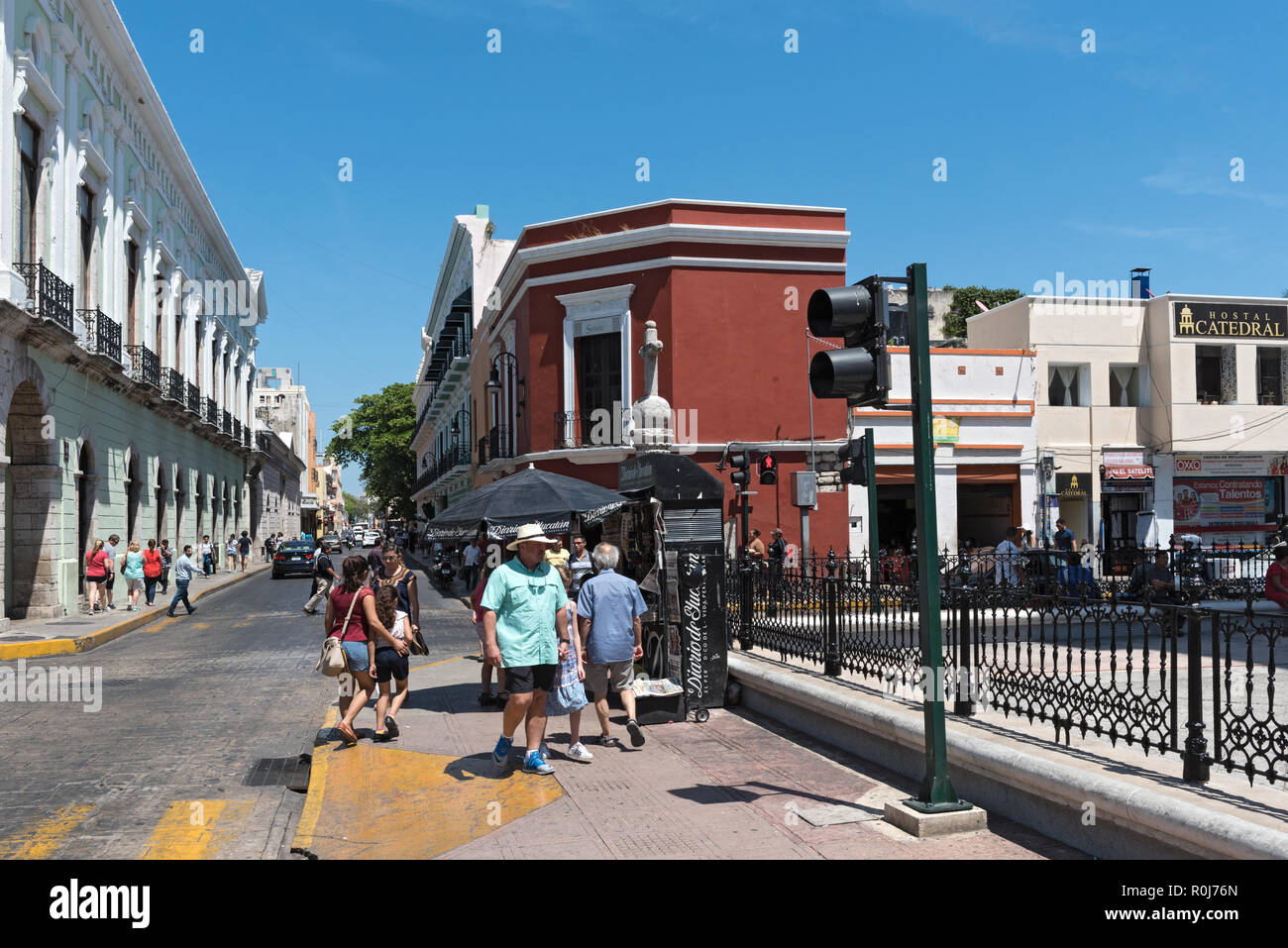 street with houses and shops in downtown merida, mexico. Stock Photo