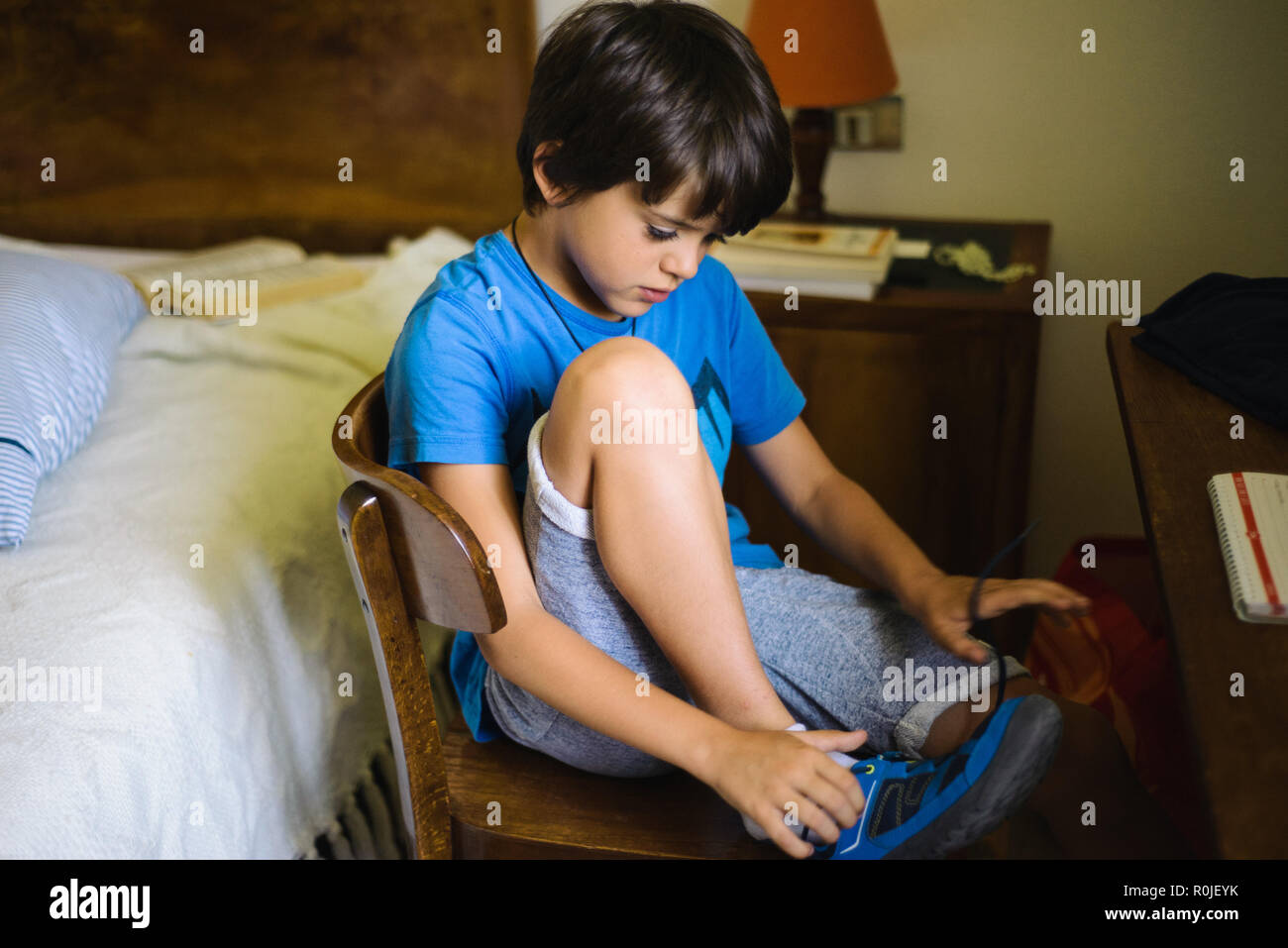 Boy wearing sandals hires stock photography and images Alamy