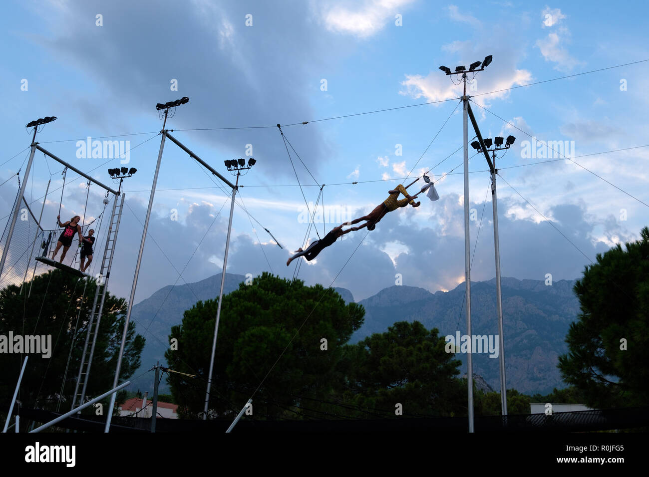 Flying trapeze school with circus activities at the Club Med Palmiye luxury all inclusive resort, Kemer, Antalya, Turkey Stock Photo