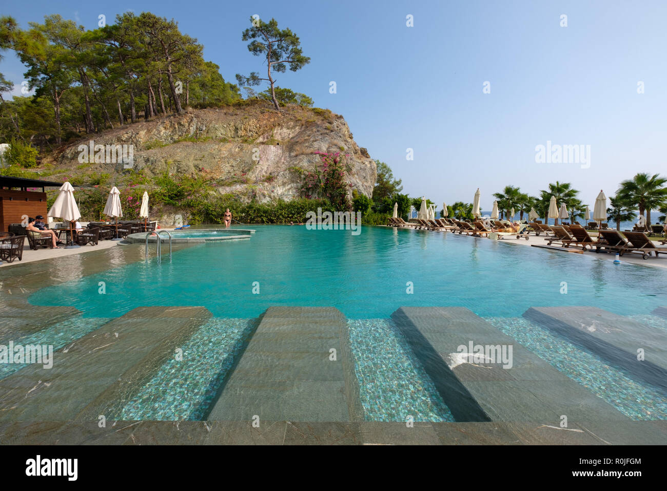 Outdoor swimming pool at the Club Med Palmiye luxury all inclusive resort, Kemer, Antalya, Turkey Stock Photo