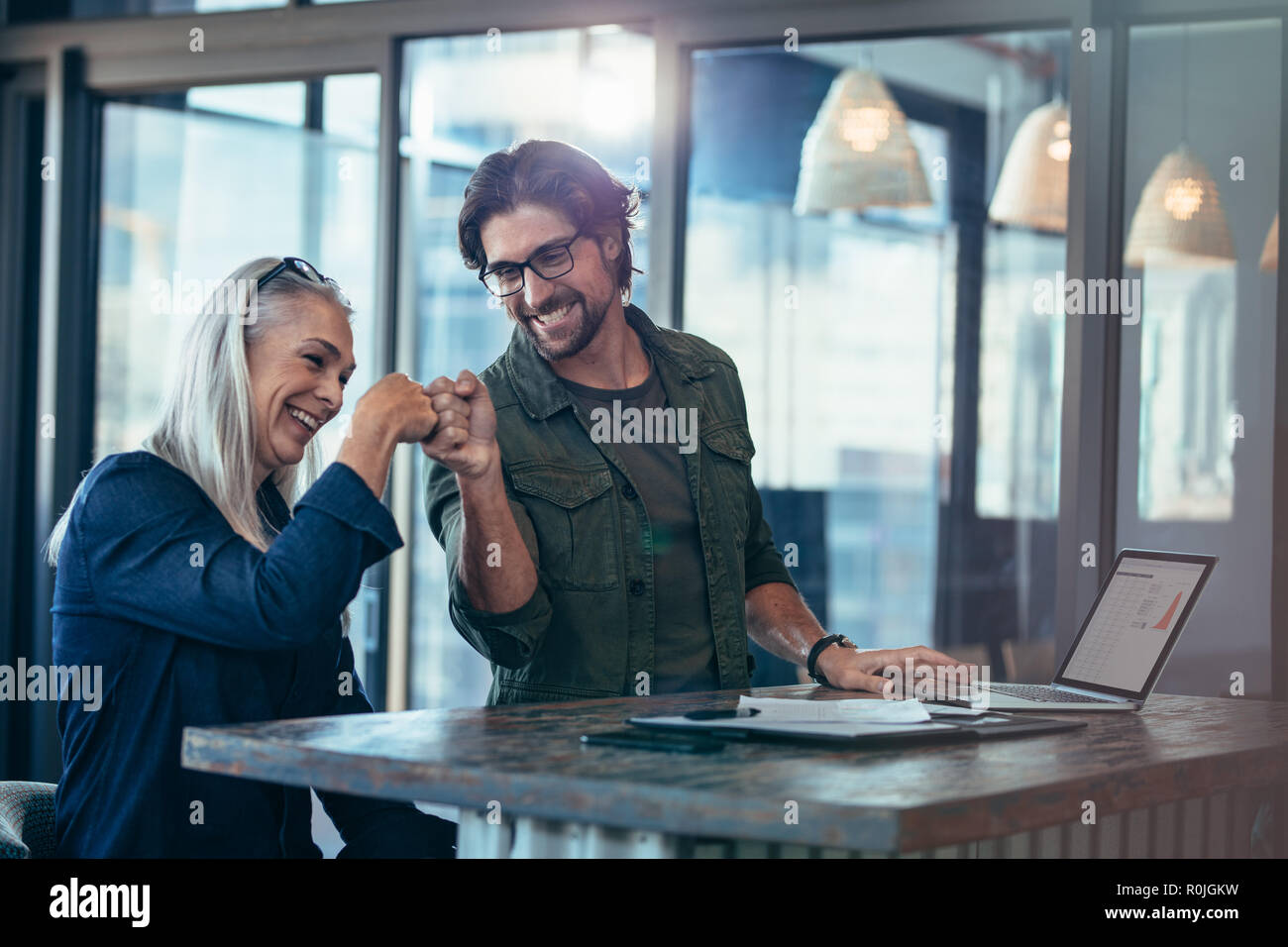 Mature woman fist happy hi-res stock photography and images - Alamy