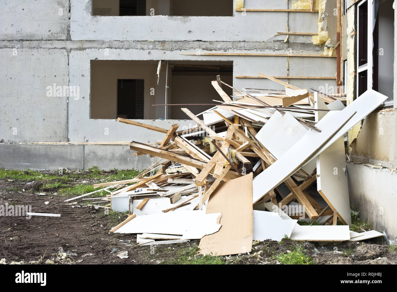 Pile of wood debris at a building demolition site. Construction waste