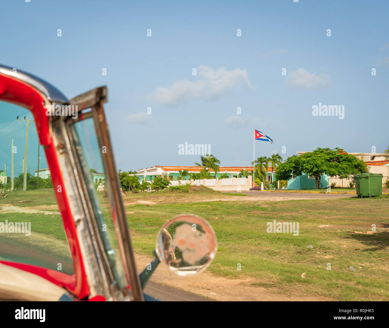 Cuba Varadero, view inside an old vintage classic american car on the right Cuban flag,sunny day. Stock Photo