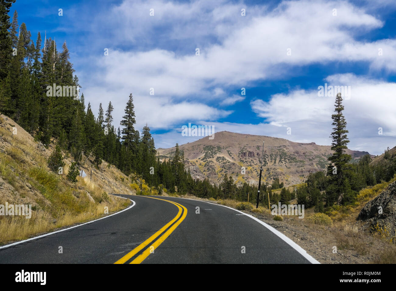 Driving through the Sierra mountains towards Sonora pass, California Stock Photo
