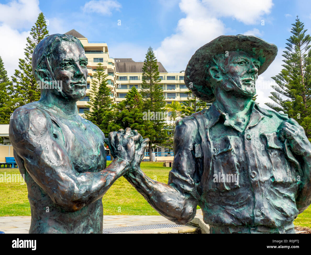 The Fallen Lifesavers bronze statue by Alan Somerville on Goldstein Reserve Coogee Beach Sydney NSW Australia. Stock Photo