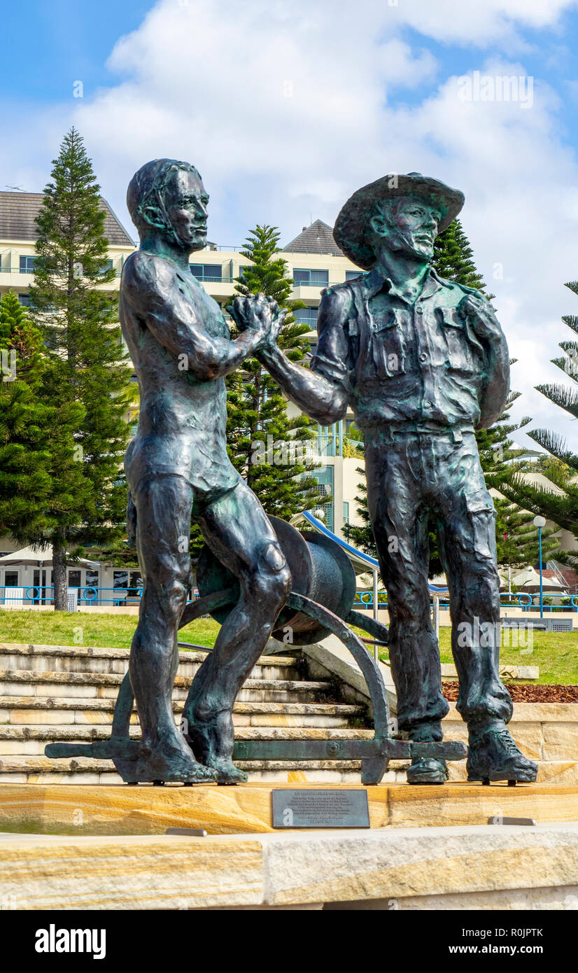 The Fallen Lifesavers bronze statue by Alan Somerville on Goldstein Reserve Coogee Beach Sydney NSW Australia. Stock Photo