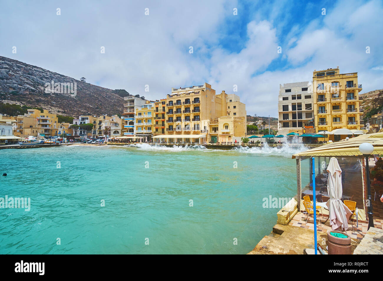 The waterfront with line of small cafes, family restaurants and tourist
