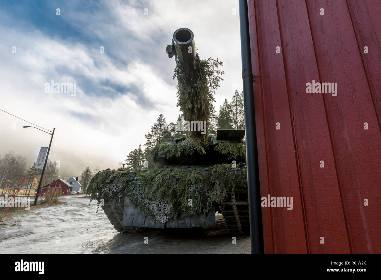 German main battle tank Leopard 2 securing the assembly area of the German battle group. NATO exercise Trident Juncture, at Norway, Engerdal, on November 03, 2018.     Photo: SGM Marco Dorow, German Army. Stock Photo