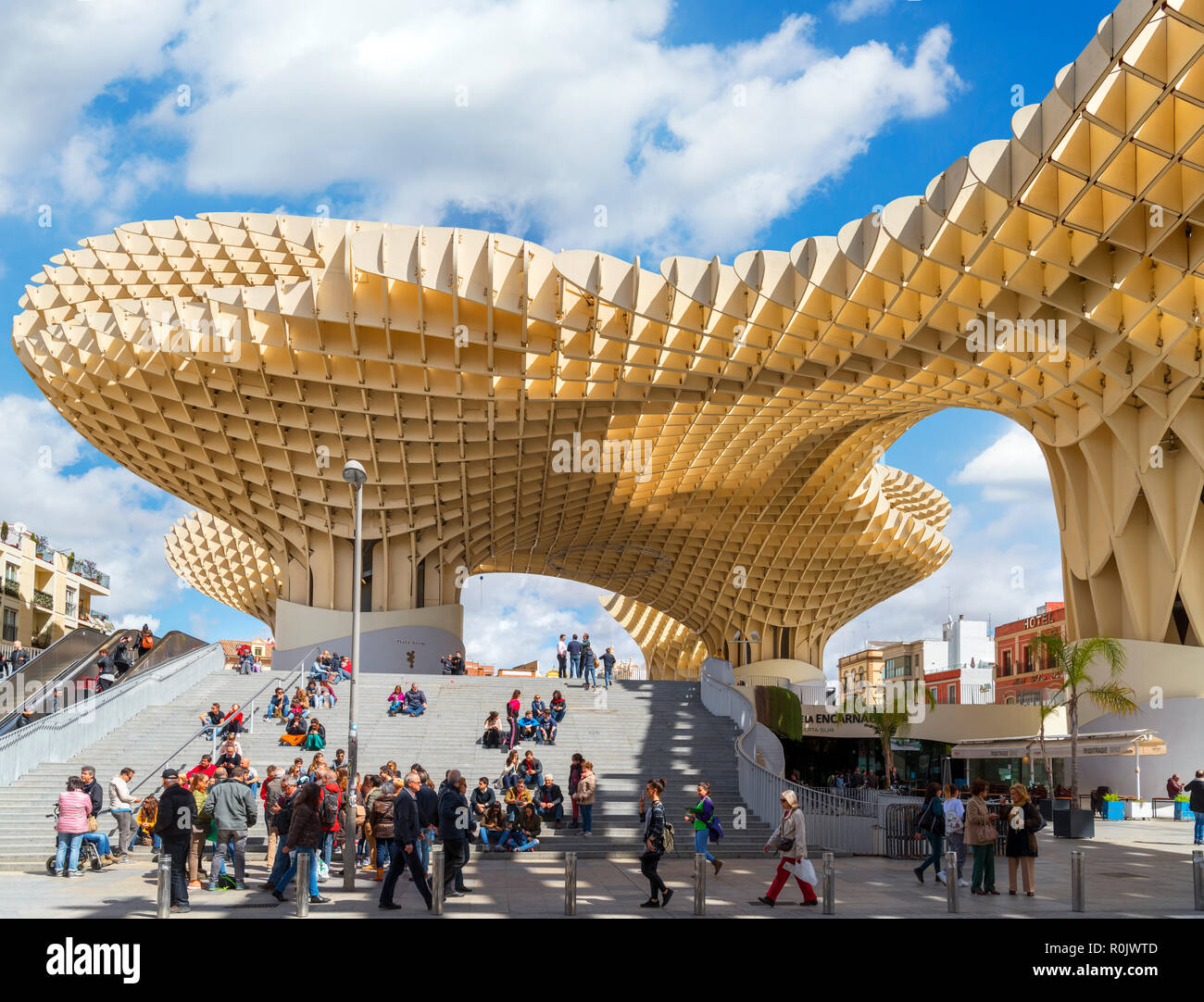 Tourists sitting on the steps of Las Setas ( Metropol Parasol ), Plaza ...