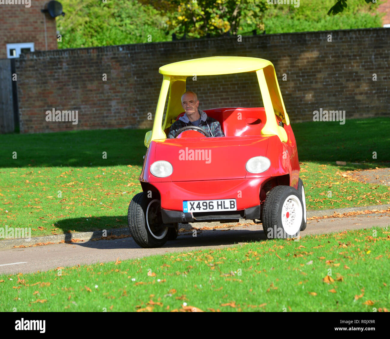 street-legal Little Tikes red-and-yellow car is  for sale on eBay. It's a one of a kind car,Attitude Autos says that it took 16 weeks to create the car, transforming it out of a Daewoo Matiz. The car tops out at 70mph, seats two, drives manual, and now has around 5,000 miles of road use on it. The eBay page has it listed at £21,500 (about $33,200 USD), down from what Attitude Autos says was the car's initial appraisal of $46,000 USD Stock Photo