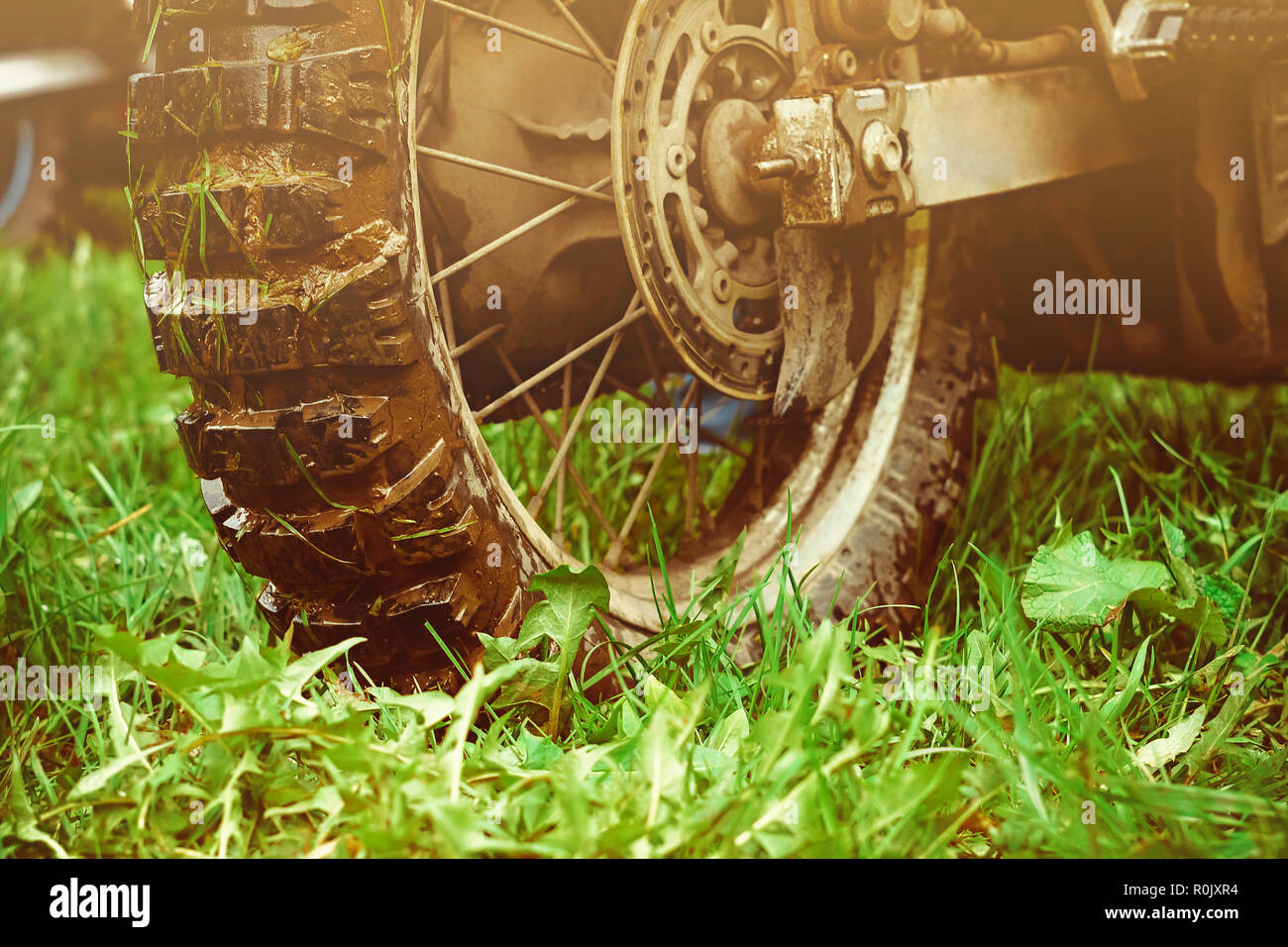 Close-up of biker sitting on motorcycle in starting point before the ...