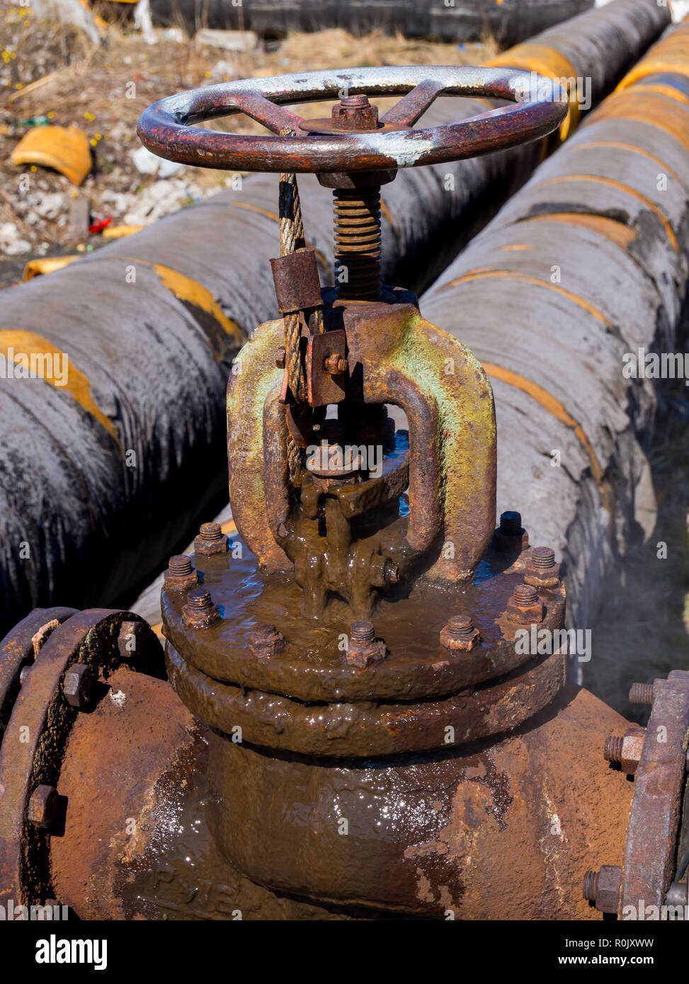 Leaking valve of the old heat supply line Stock Photo Alamy