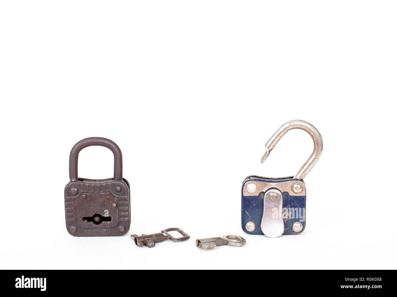 Open and closed vintage padlocks and keys isolated on white background ...