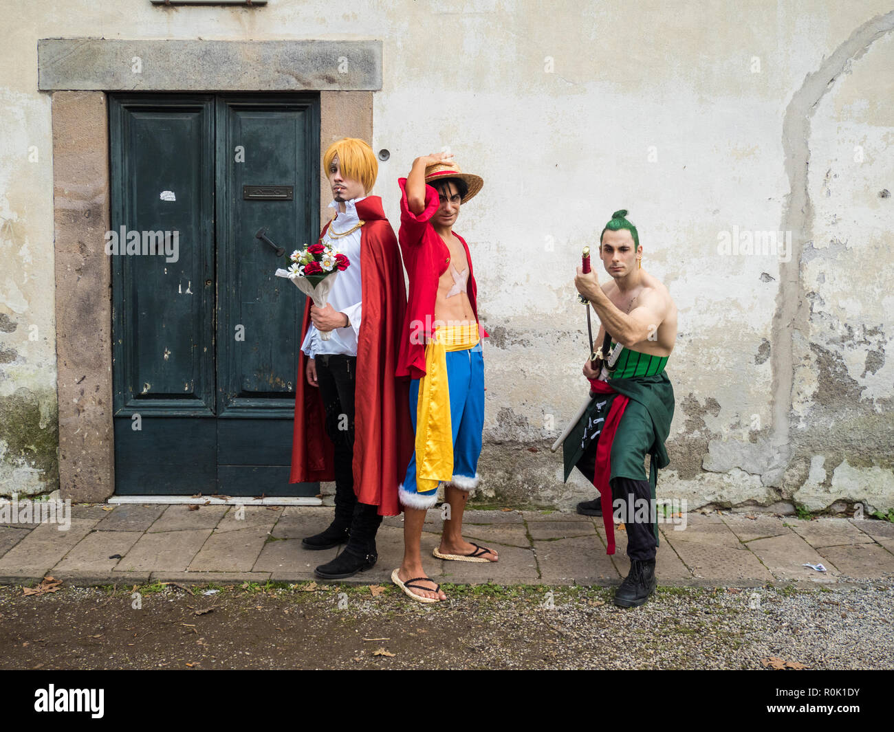Participants posing for a photo at the Lucca comics & games, an annual comic book and gaming convention in the walled city of Lucca, Tuscany, Italy Stock Photo