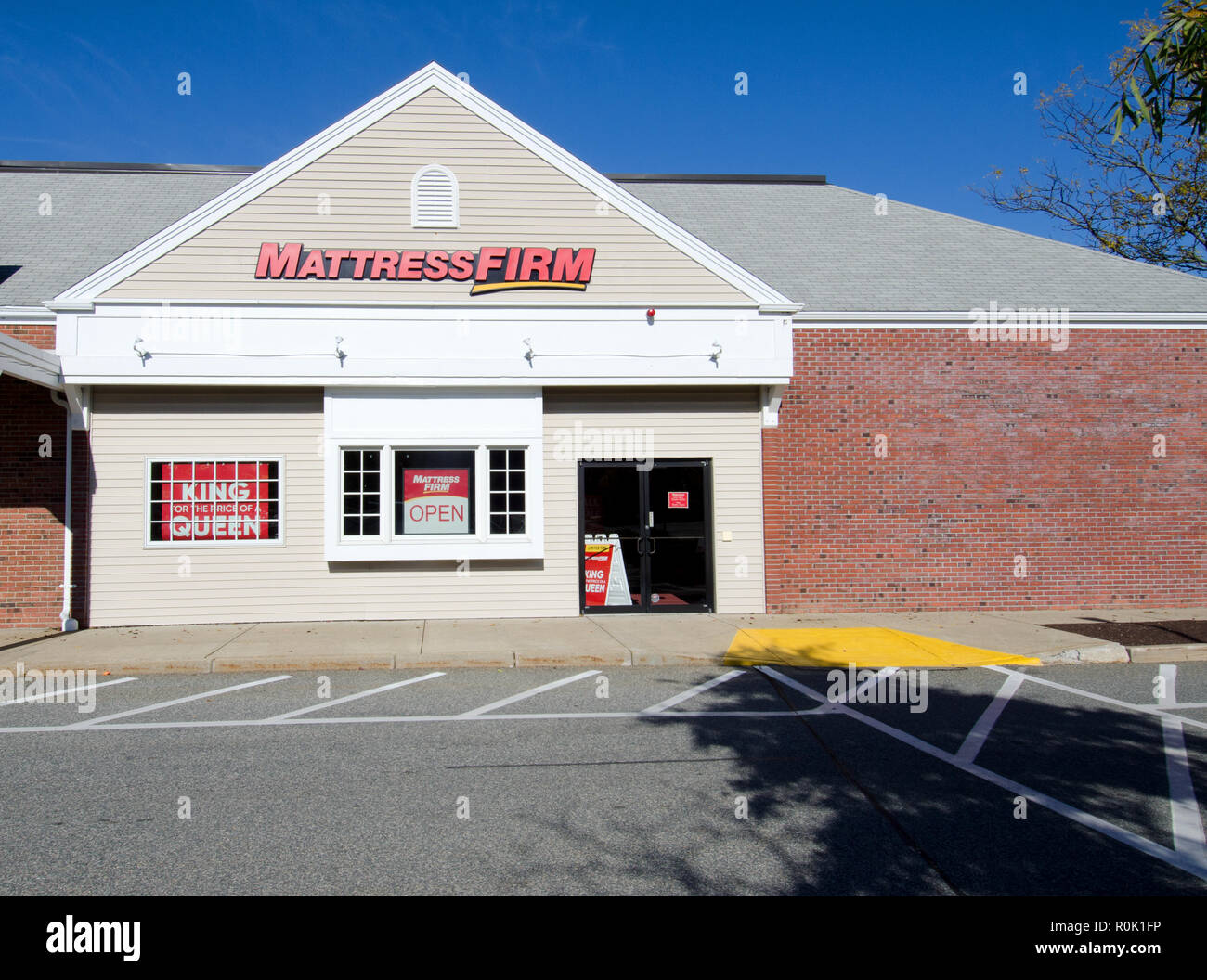 Mattress Firm store exterior in Orleans, Cape Cod, Massachusetts USA with clear blue sky Stock Photo
