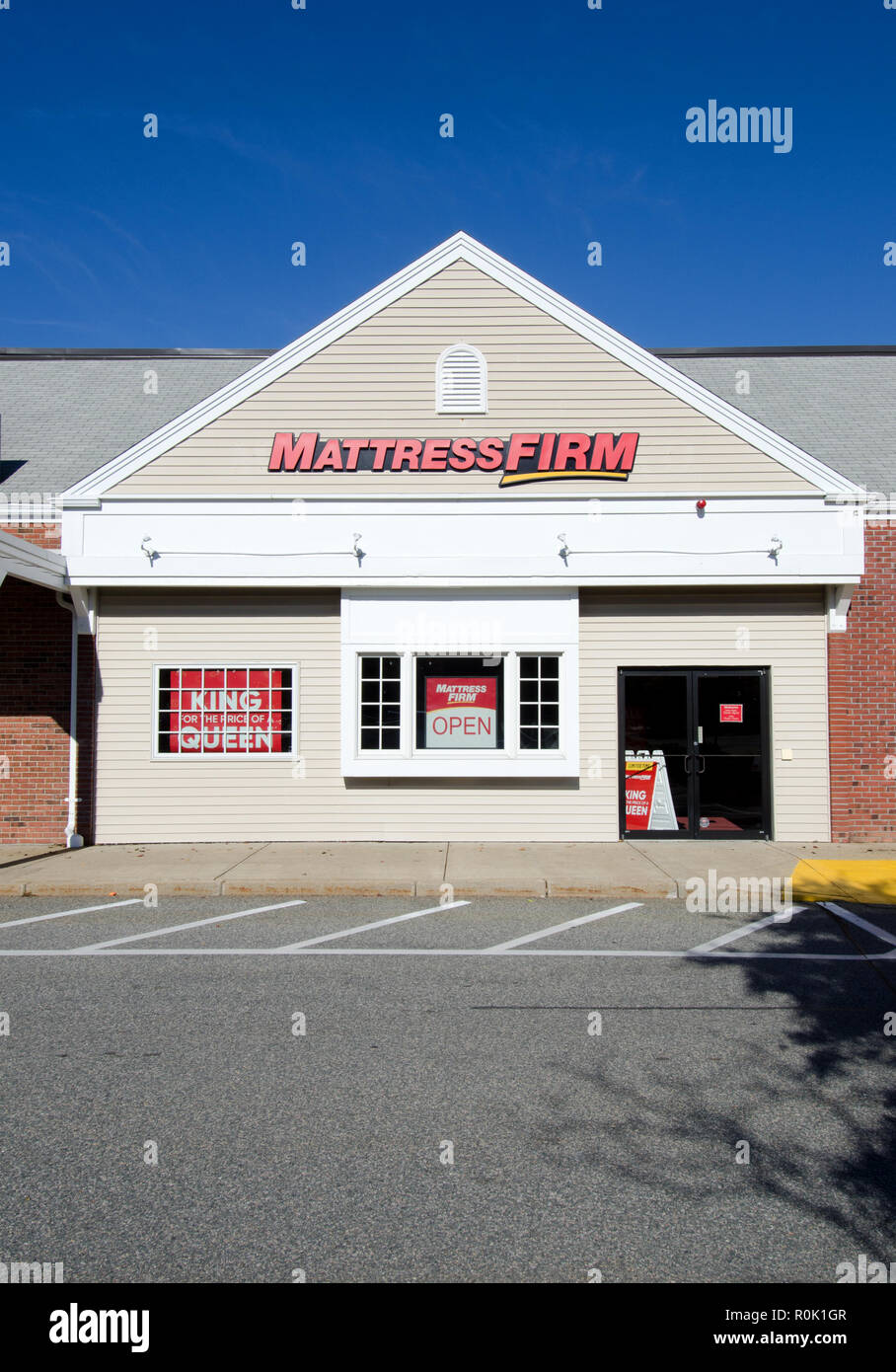 Mattress Firm store exterior in Orleans, Cape Cod, Massachusetts USA with clear blue sky Stock Photo