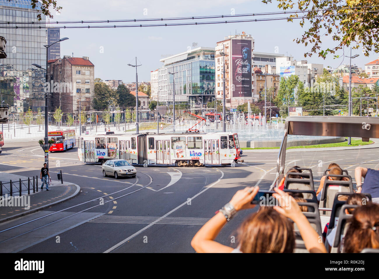 BELGRADE, SERBIA - SEPTEMBER 09, 2018 : Tourist look sights of Belgrade by sightseeing bus, travel by tour bus. Stock Photo