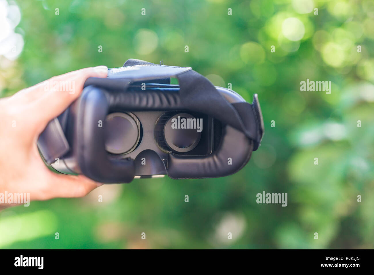 Side view of VR Glasses or Virtual Reality Headset use with smartphone. VR  is an immersive experience in which your head movements are tracked in 3d  Stock Photo - Alamy