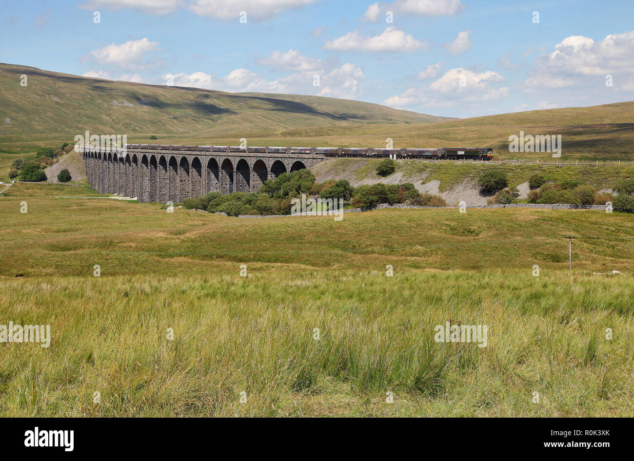 66779 heads over Ribblehead with a Arcow to Hunslet service. Stock Photo