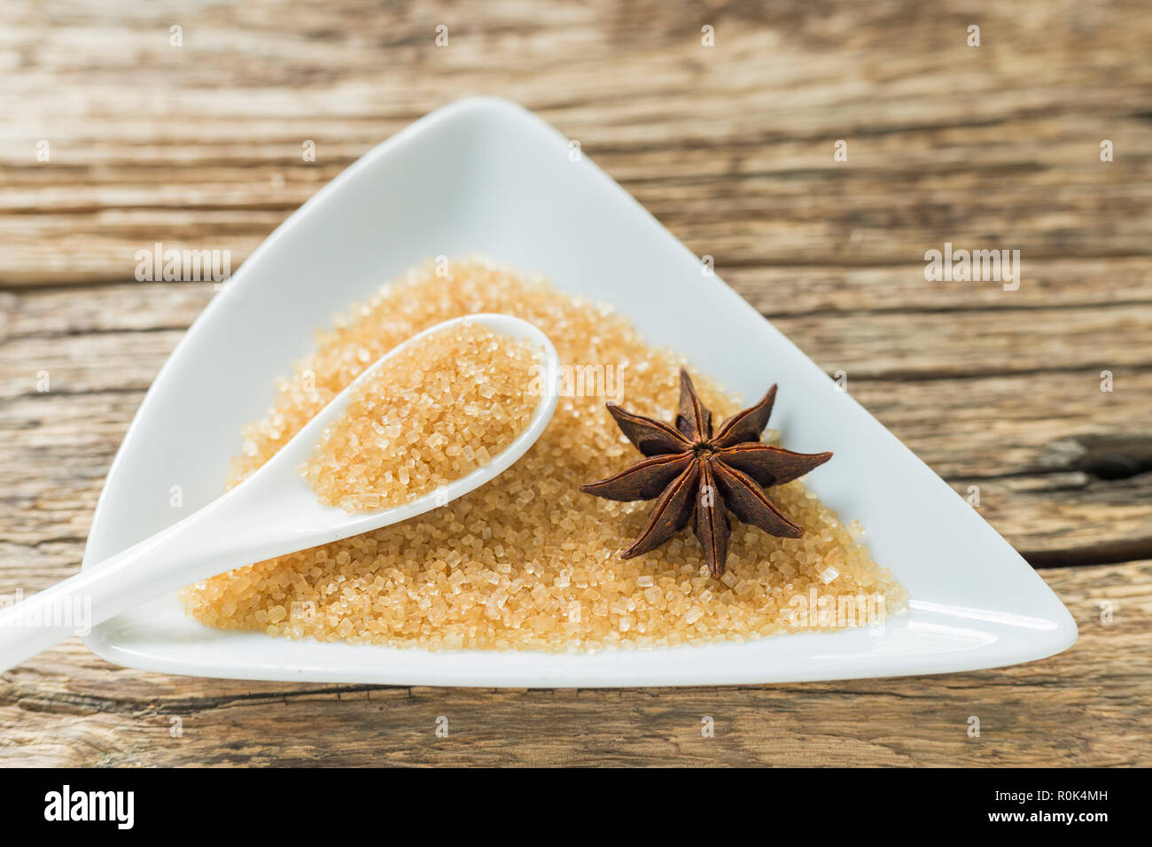brown sugar in spoon and anise on the me.... Stock Photo