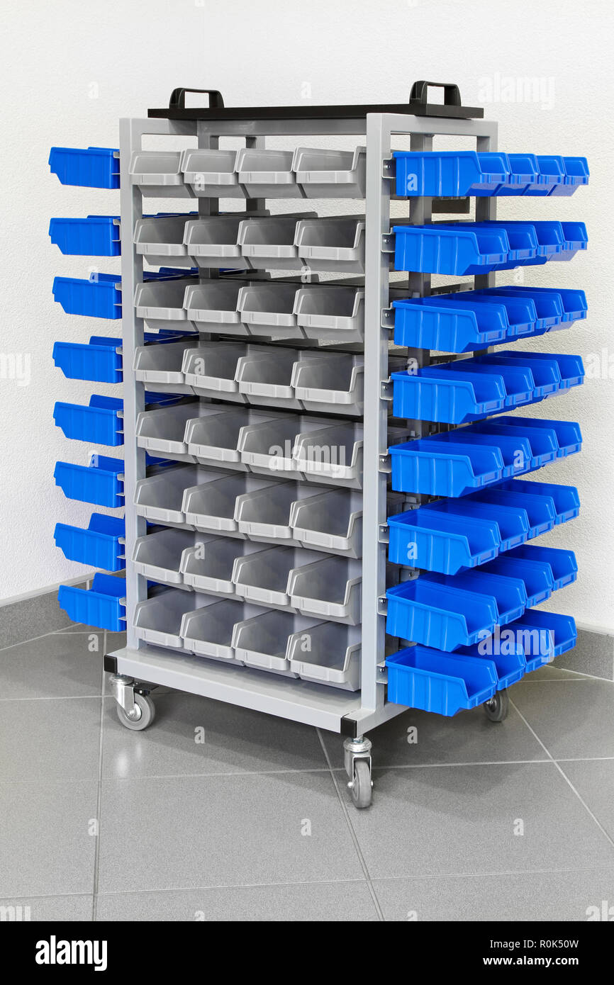 Trolley with plastic shelves for garage shop Stock Photo Alamy