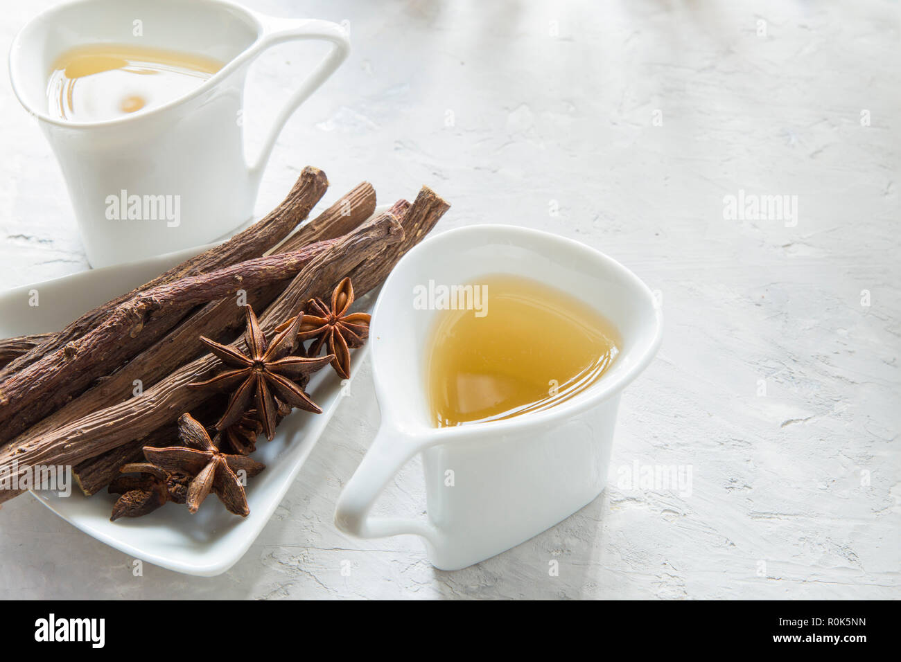 anise tea and liquorice roots on the table Stock Photo Alamy