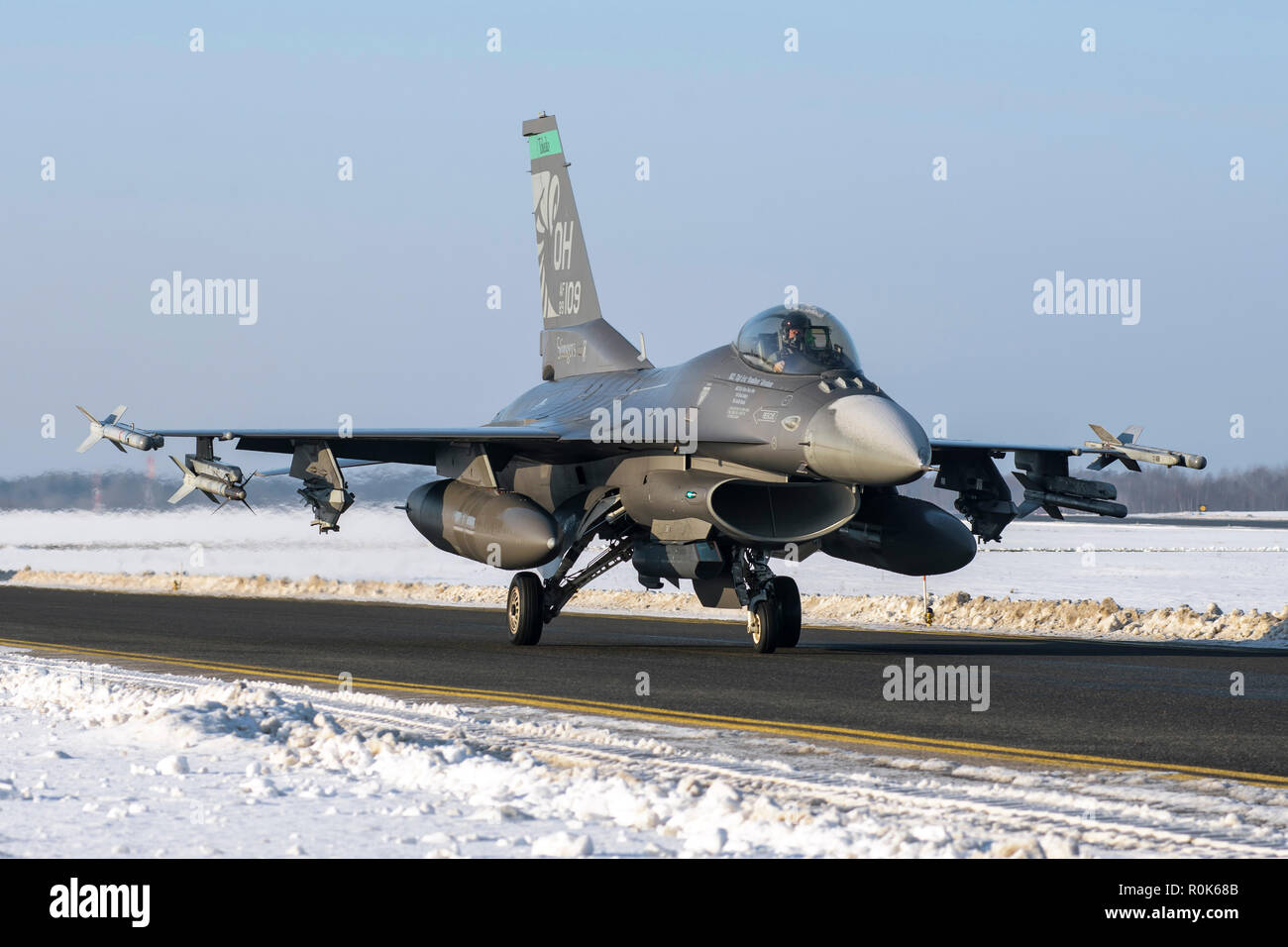 An F-16 from the 180th Fighter Wing, Air National Guard, taxiing on the runway at Amari Air Base, Estonia, in support of Operation Atlantic Resolve. Stock Photo