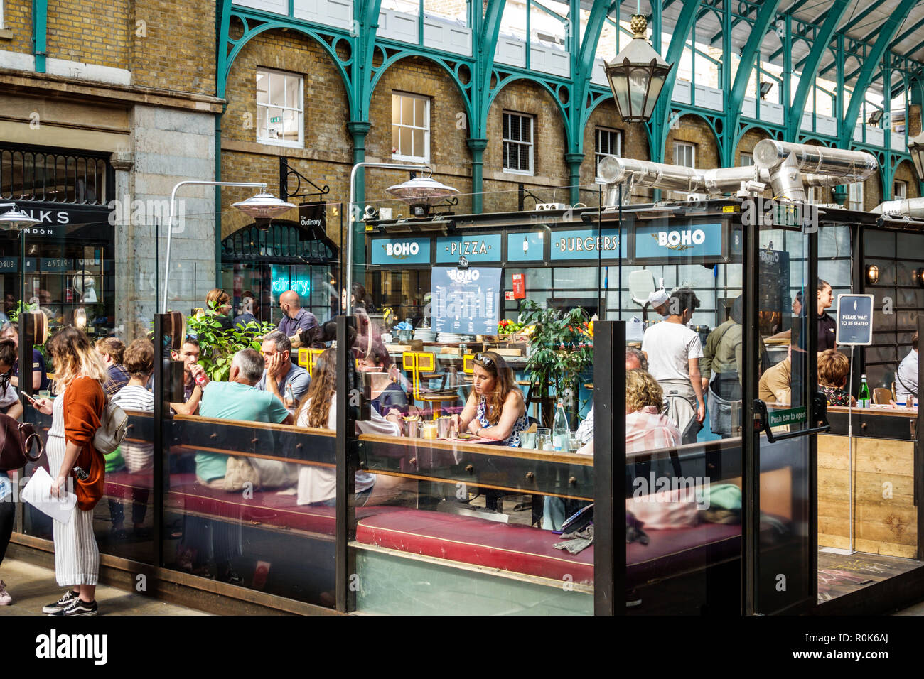 London England,UK,Covent Garden,market,shopping dining entertainment,Apple Market,Charles Fowler,neo-classical building central hall,1830,BOHO Cafe,ma Stock Photo