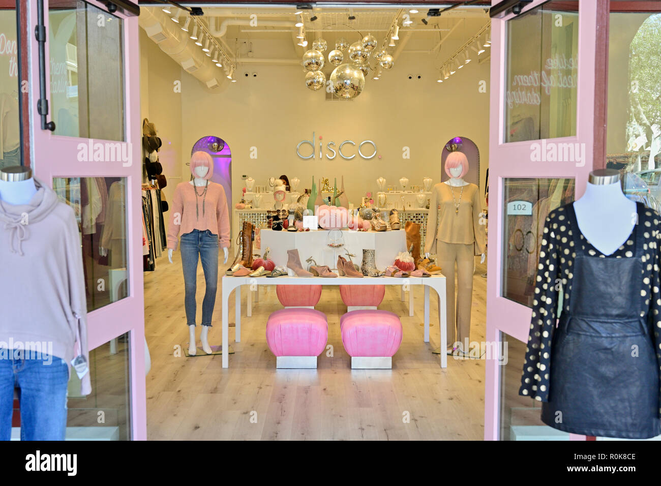 Disco, a young woman's clothing boutique clothing and accessory store in fashionable resort town of Rosemary Beach Florida USA. Stock Photo