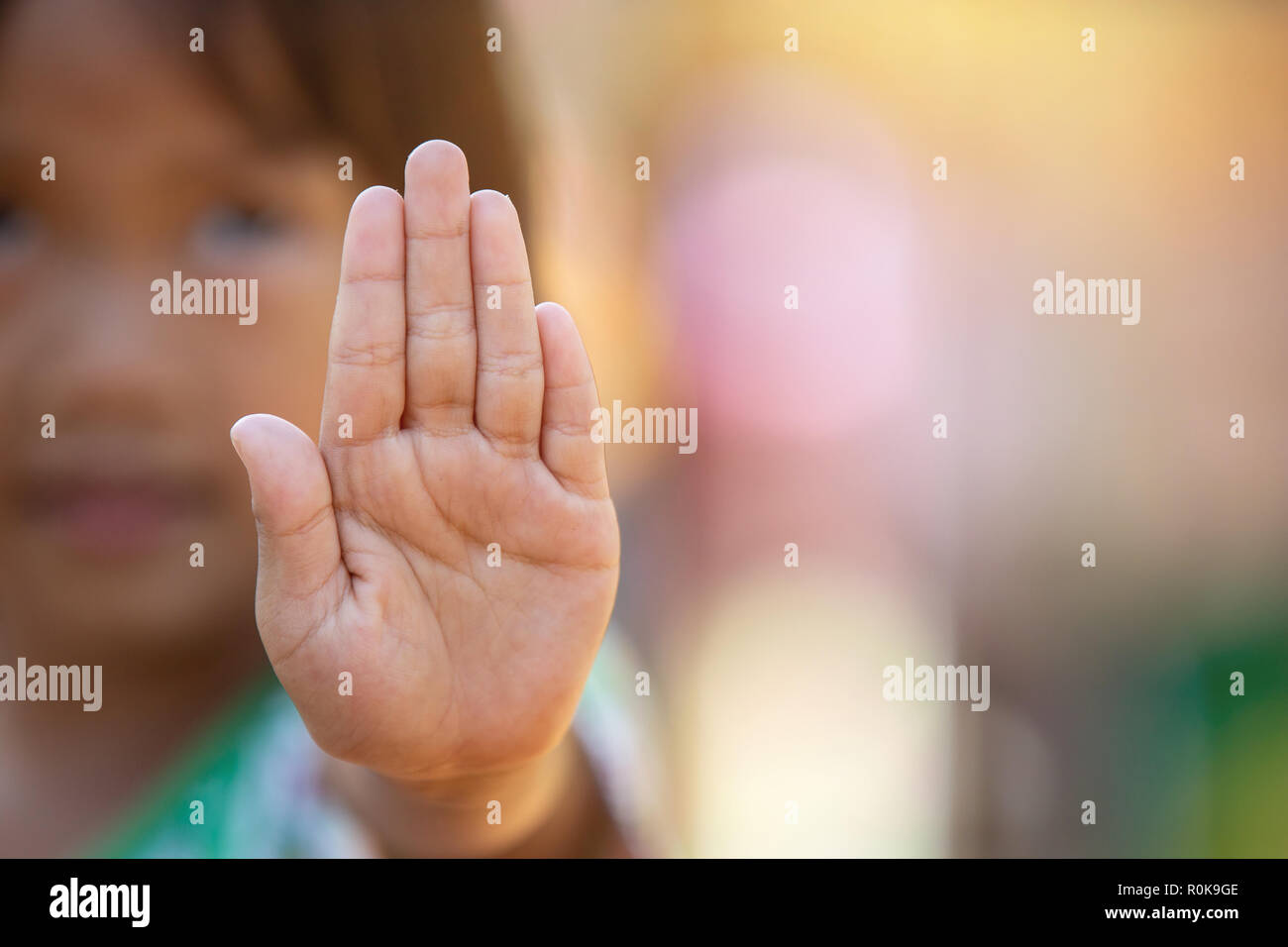 Stop harassment child and stop violence abuse in child. Hand stop no. Stock Photo
