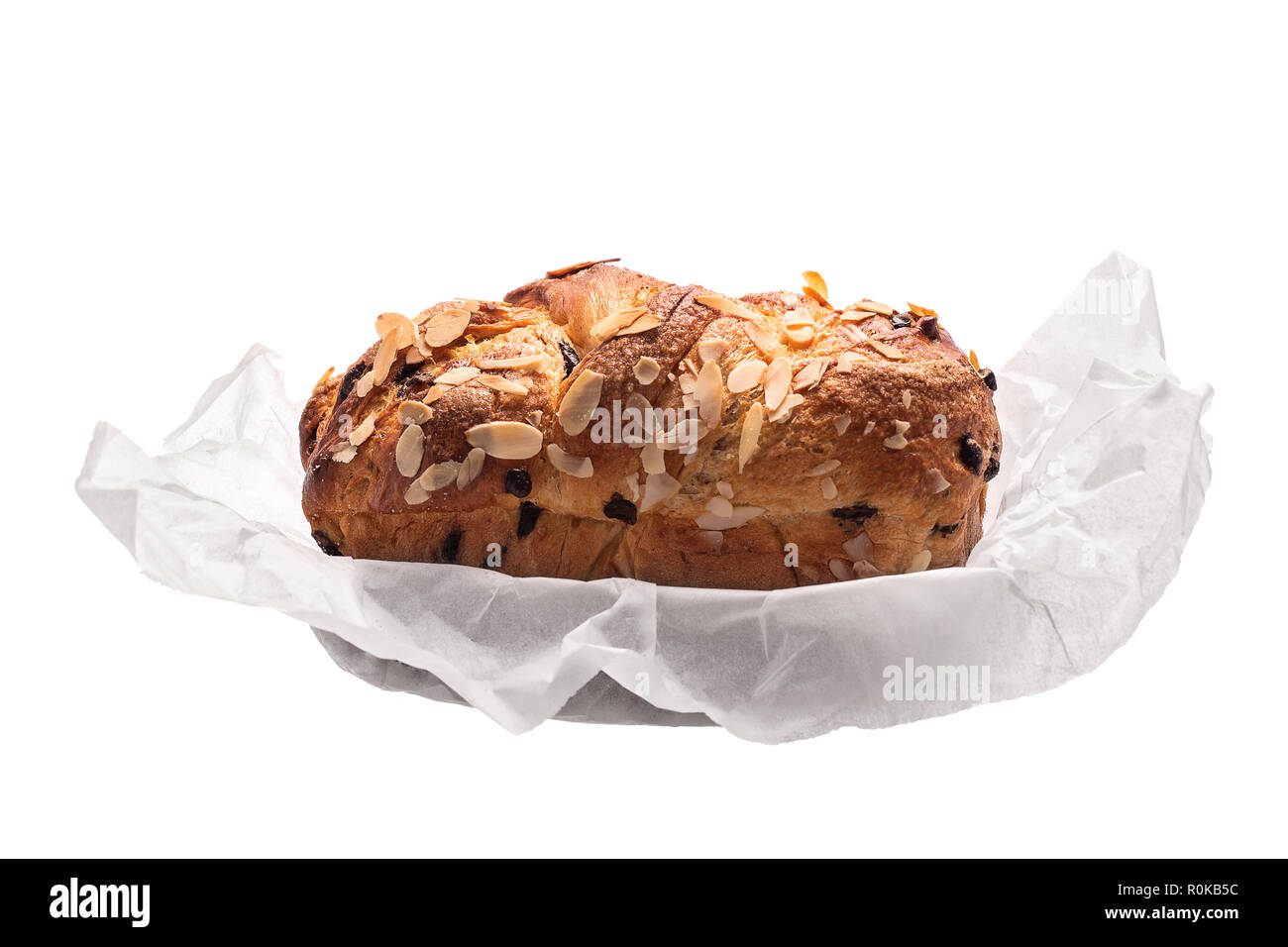 Easter bread with chocolate and almonds isolated on white background. Stock Photo