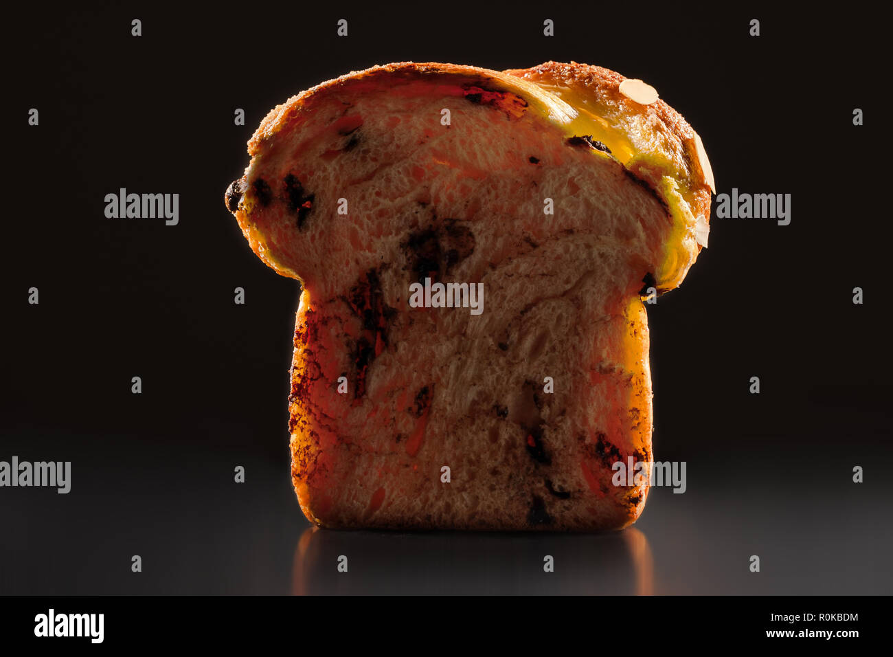 Easter bread with chocolate and almonds isolated on white background. Stock Photo