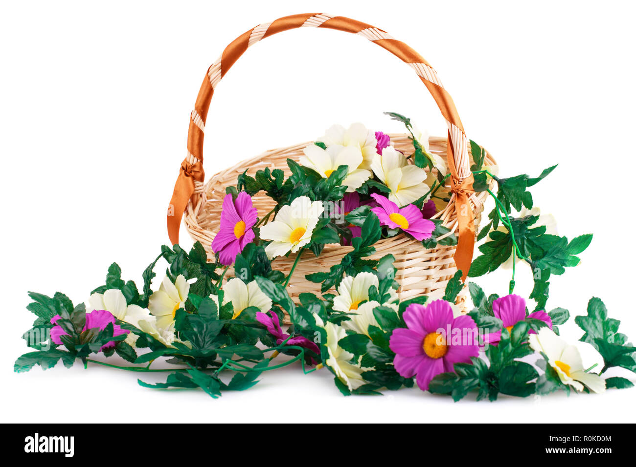 Fabric flowers in wicker basket isolated on white background Stock ...