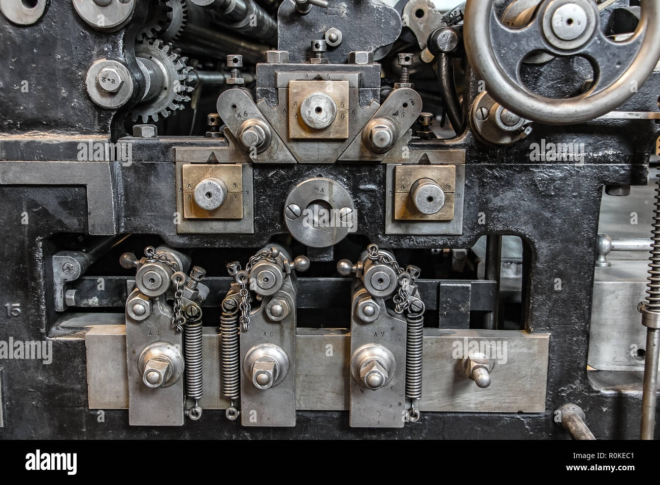The detailed look at the part of high-speed rocking press, made in Germany 1910. A steel machine complicated  as perpetuum mobile, close up. Stock Photo