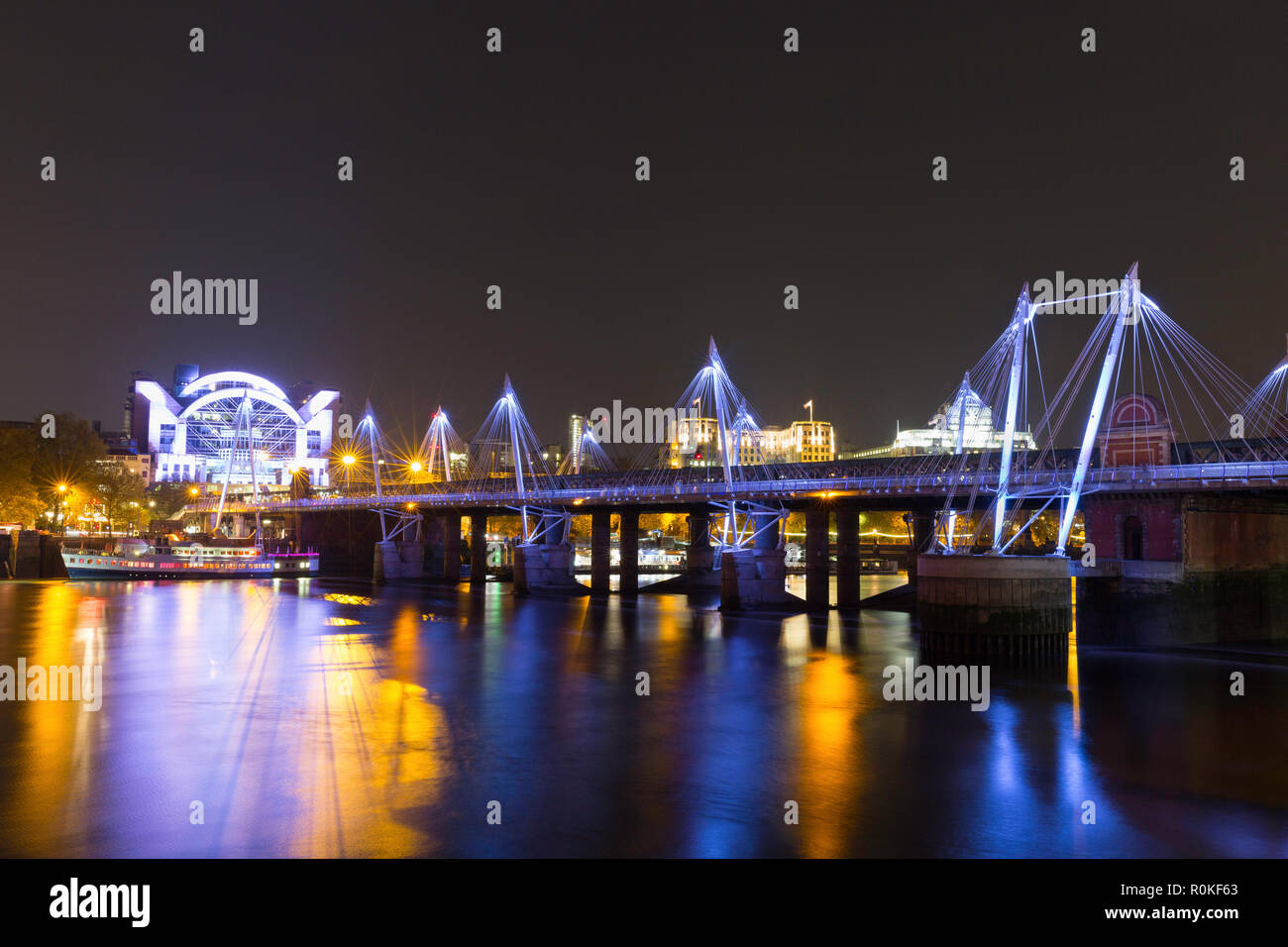 Looking northwest towards the Jubilee Bridge at night, London, England Stock Photo