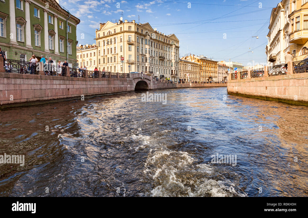 19 September 2018: St Petersburg, Russia - Some of the grand old buildings which line the canals of the city, taken from one of the canal boats. Stock Photo