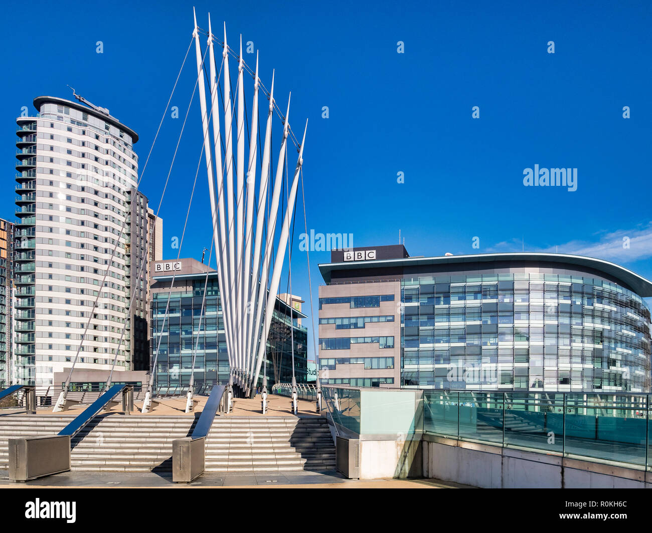 2 November 2018: Salford Quays, Manchester, UK -  BBC buildings, and the Media City Footbridge, which spans the Manchester Ship Canal, on a beautiful  Stock Photo