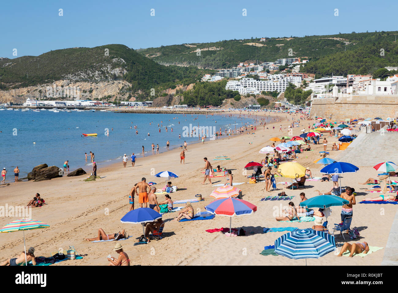 View over beach on sunny summer morning, Sesimbra, Setubal district, Lisbon region, Portugal Stock Photo