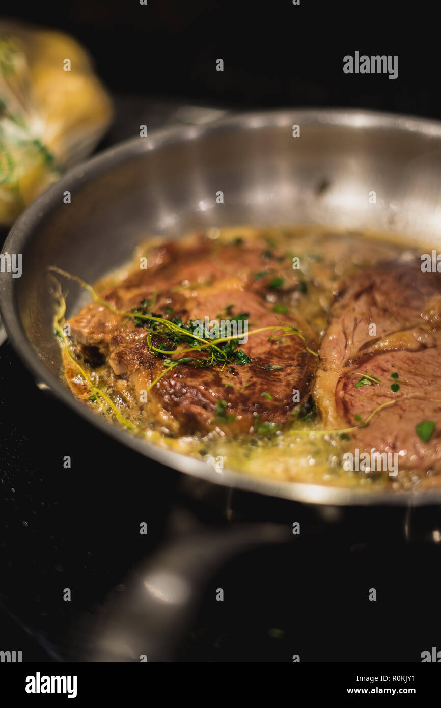 Entrecote in frying pan Stock Photo Alamy