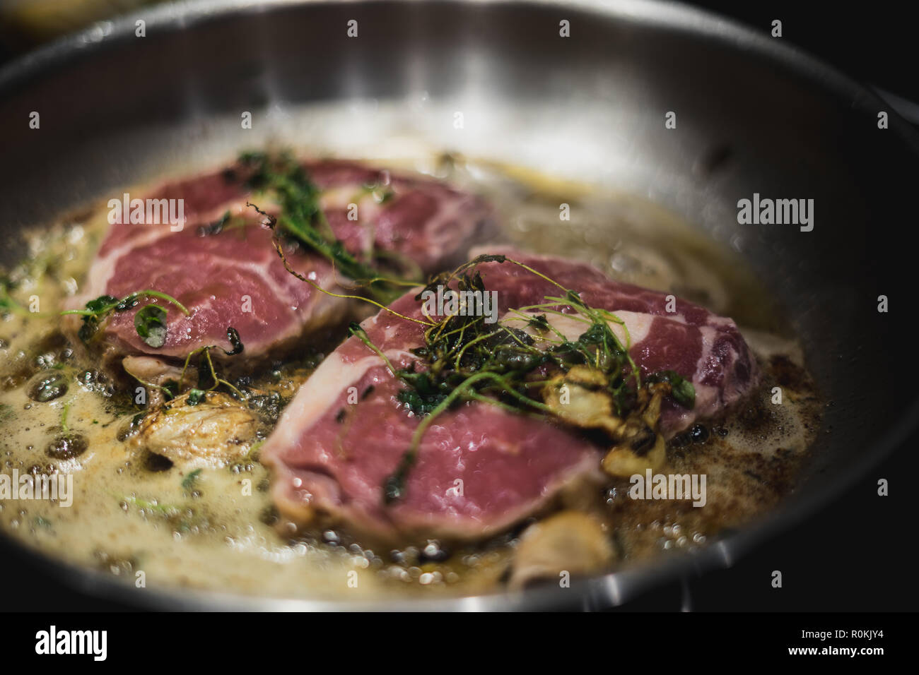 Entrecote in frying pan Stock Photo Alamy
