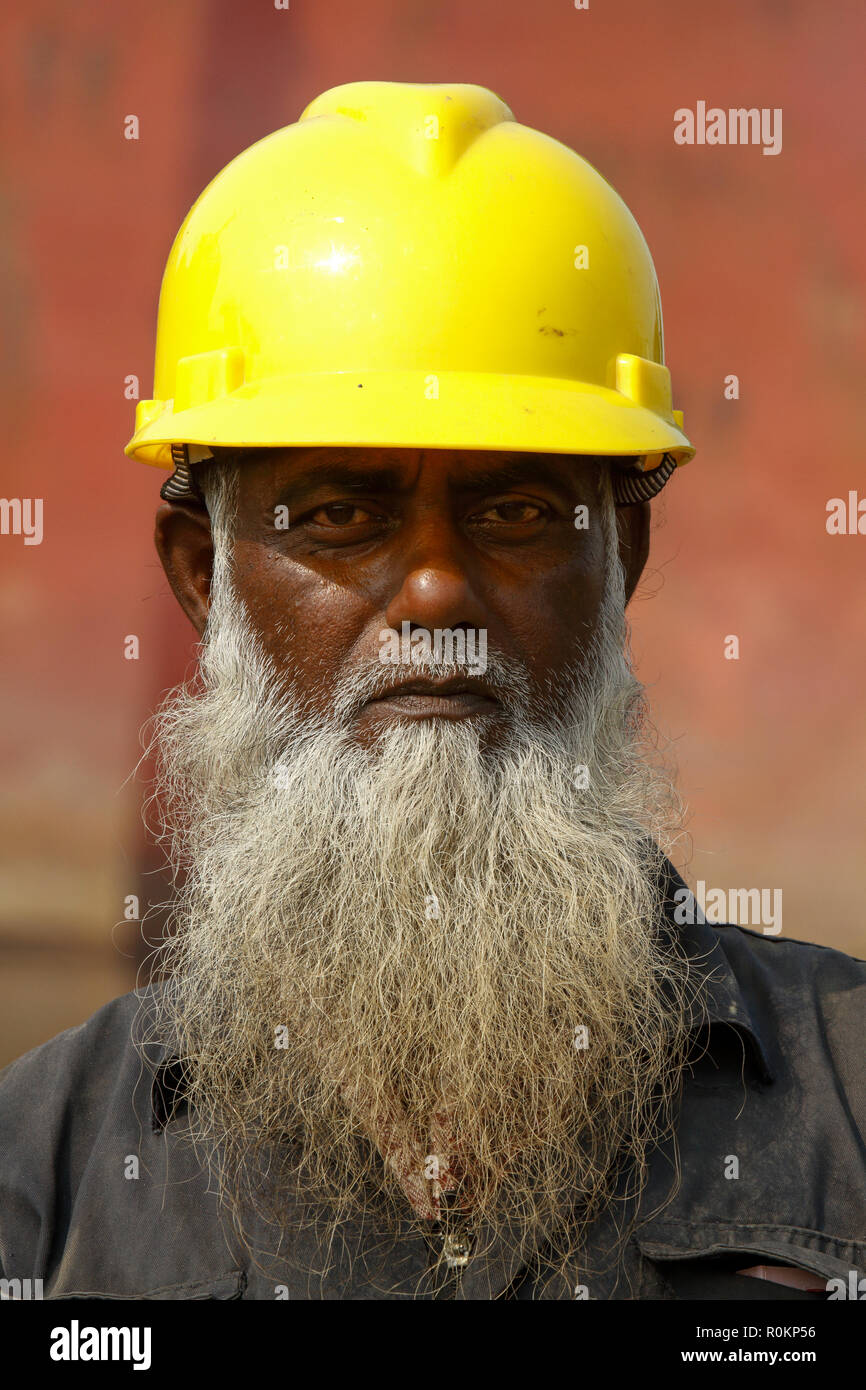 Portrait of a labourer of ship- breaking yard. Bangladesh is dependent on ship-breaking industry for 80% of its steel needs. Chittagong, Bangladesh. Stock Photo