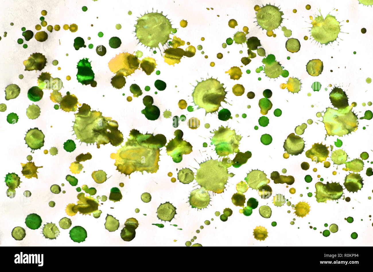 Colorful green and yellow watercolor wet brush paint liquid background