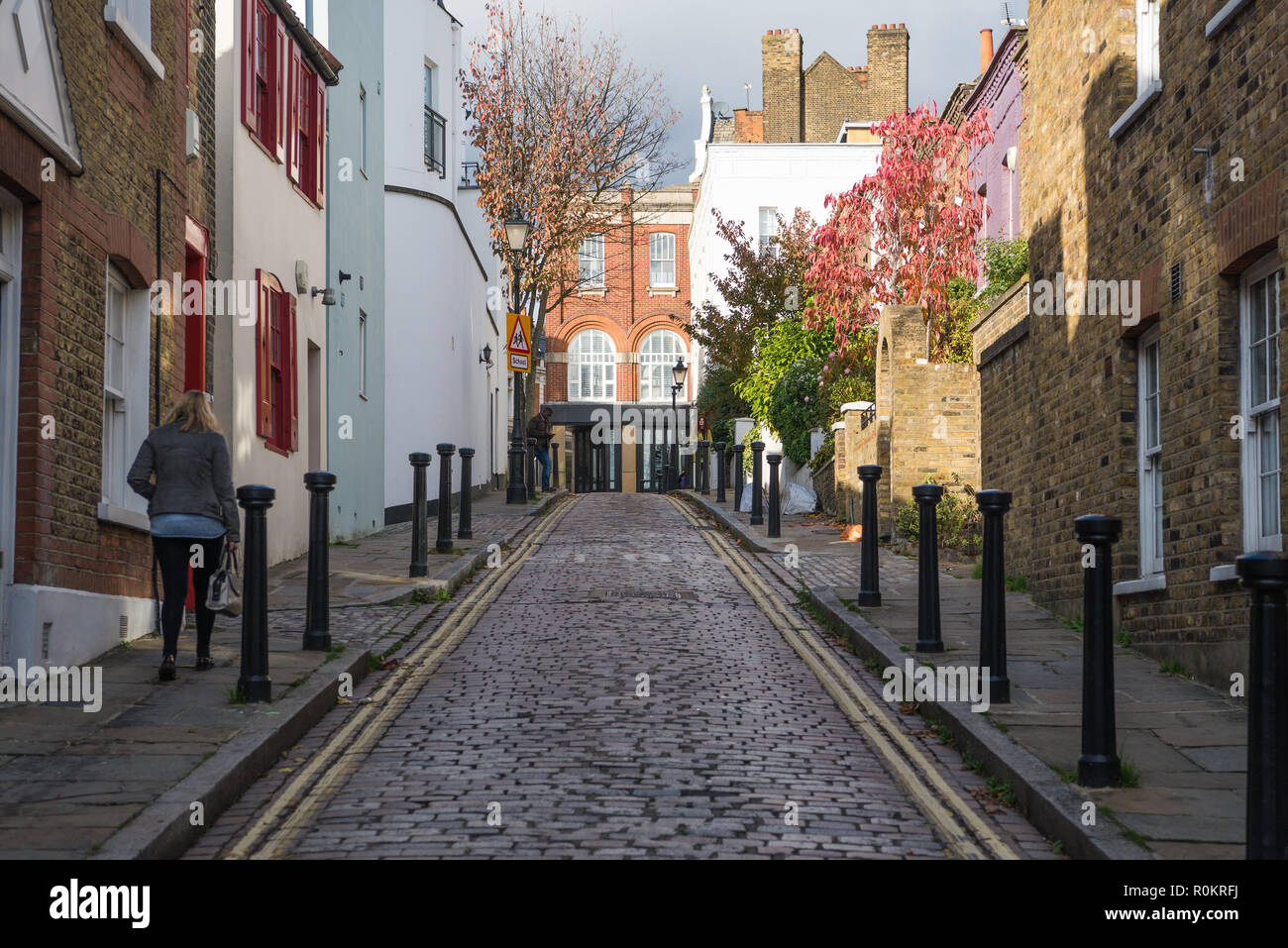 Back Lane, a pretty, narrow, cobbled street of houses in Hampstead, London, England, UK Stock Photo