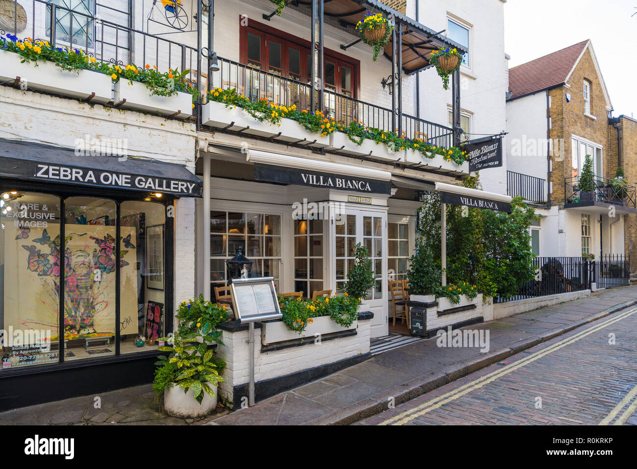 Zebra One Gallery and Villa Blanca restaurant in Perrin's Court, Hampstead, London, England, UK. Stock Photo