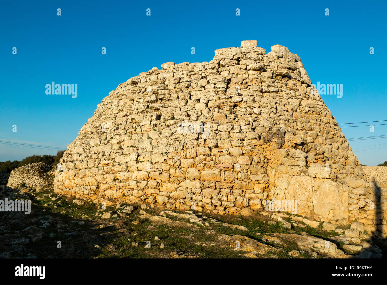 The talayot of Torellonet Vell, is a roman contruction built in the period 1000 - 700 BC Stock Photo