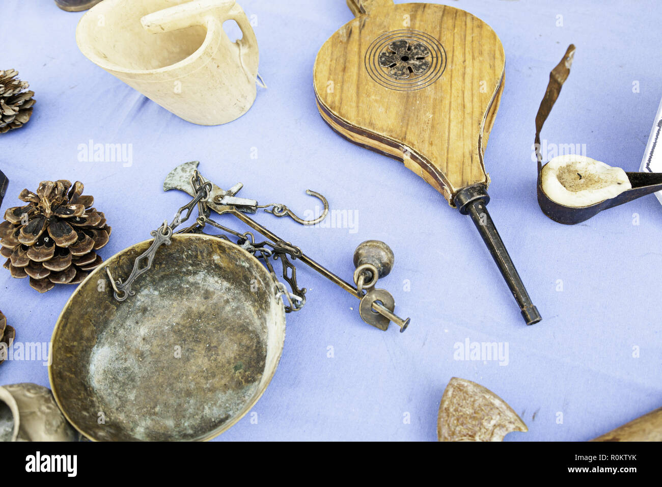Bellows and ancient balance, detail of some old tools in a town of