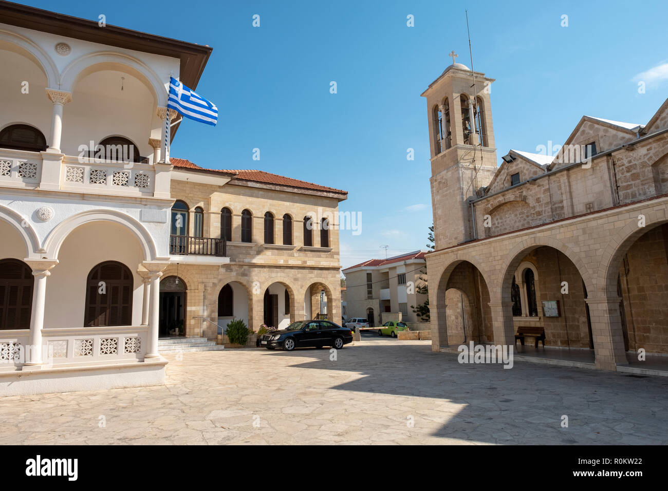 Resistance Square with Holy Bishopric of Pafos on left and Agios Theodoros Cathedral on the right in Paphos Old Town, Cyprus Stock Photo
