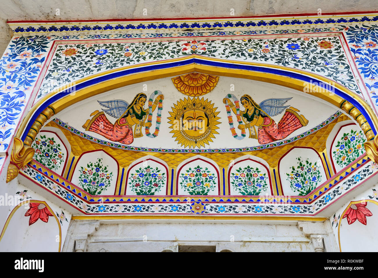 Wall paintings in the entrance gate of the city palace, Udaipur, Rajasthan, India Stock Photo